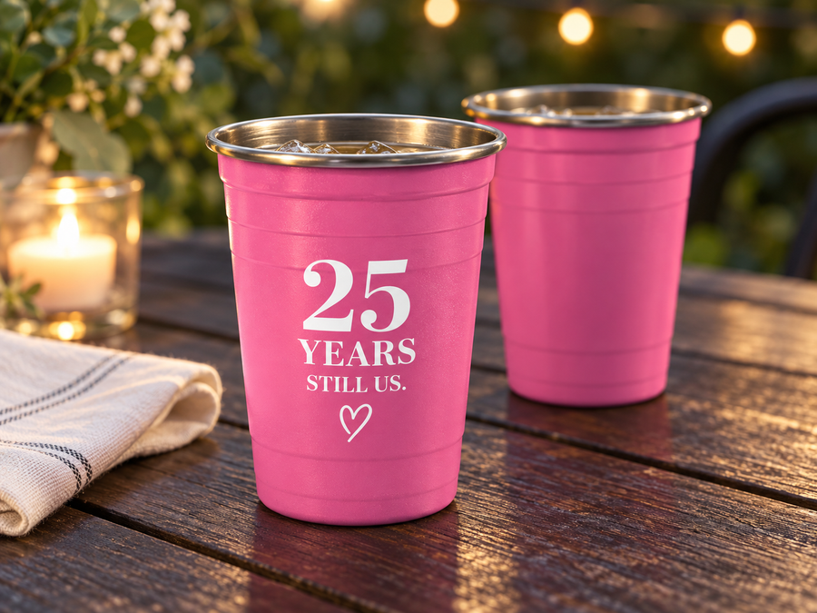 Anniversary concept: pink stainless steel cups celebrating 25 years